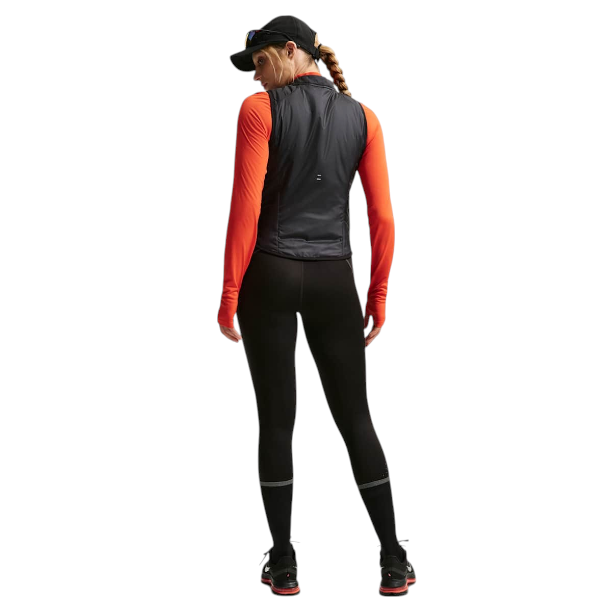 Sportskoen Nike Tempo Repel hardloopbodywarmer voor dames in zwart met reflecterende details, gezien van achteren.